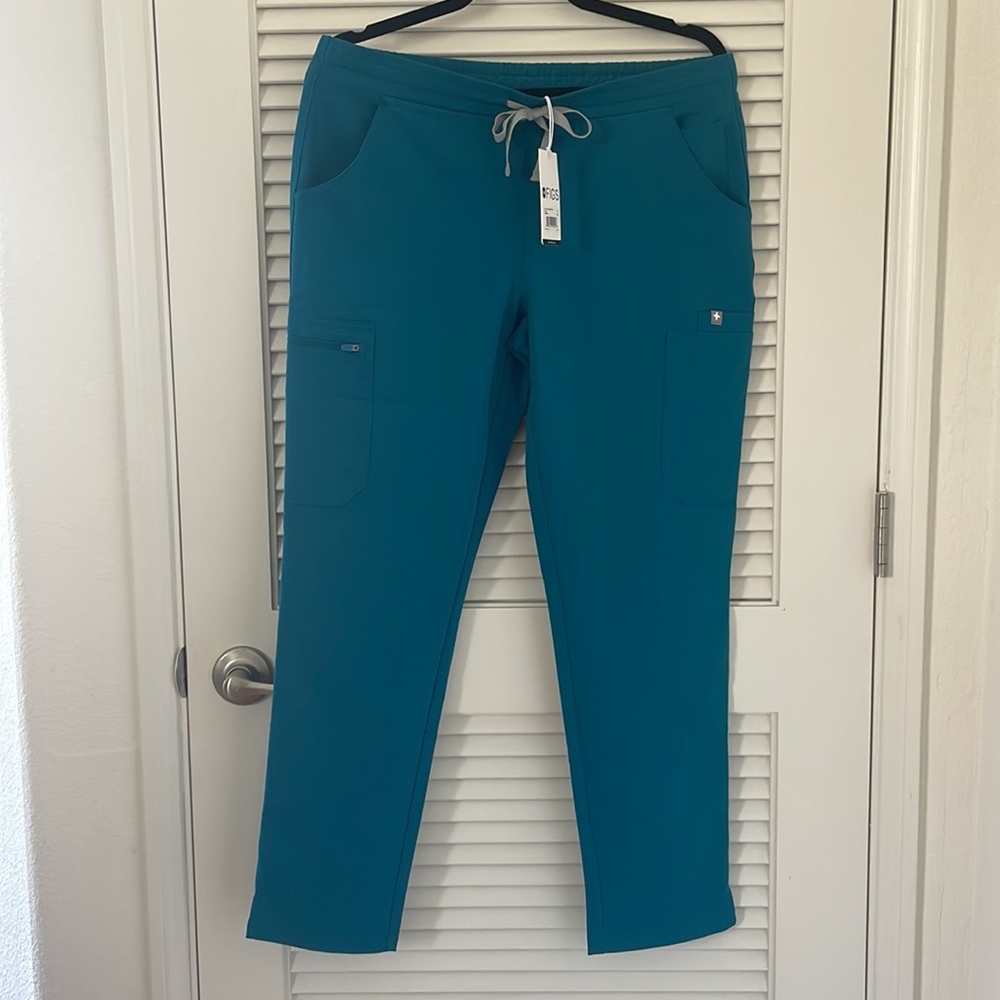 NWT. FIGS Small Petite Yola Skinny Pants in color Caribbean Blue.